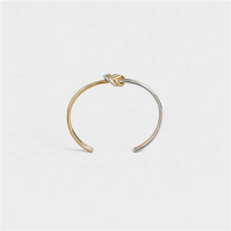 KNOT DOUBLE CUFF IN BRASS WITH RHODIUM FINISH